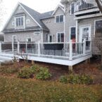 White and grey deck with black railing