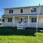 White front porch with a roof