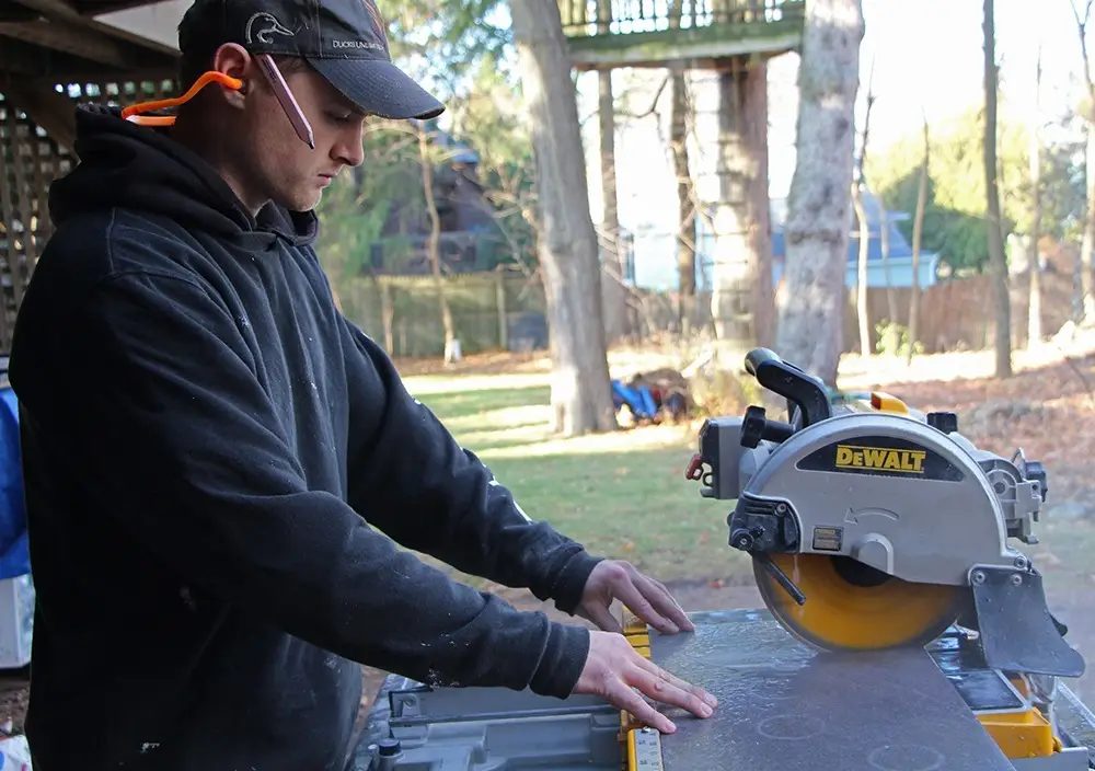 Cutting Flooring Tiles for installation.