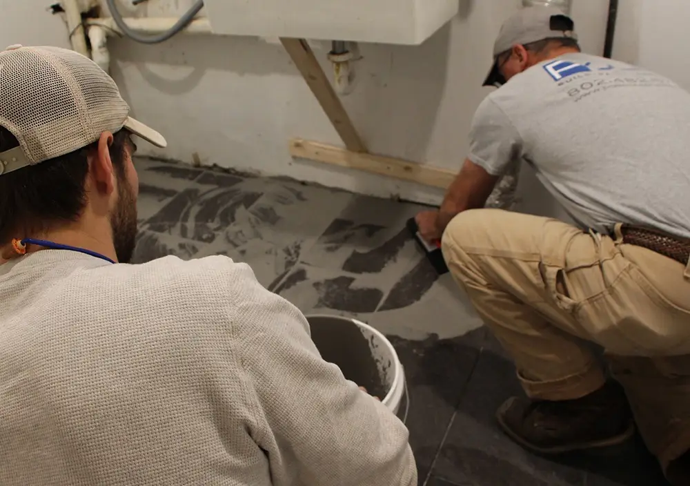 Tile placement by Polli Construction