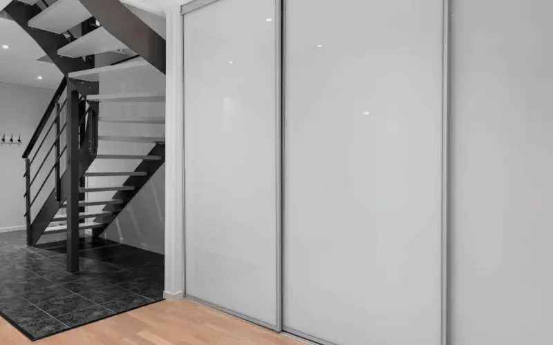 By-pass Door repaired and installed by Polli Construction.