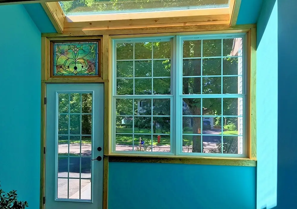 Extra-large skylight with new doors and windows installed by Polli Construction, Inc.