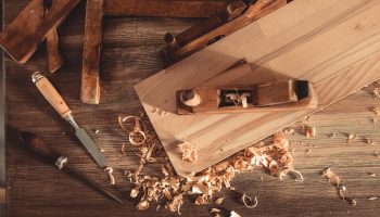 Plane,Jointer,Carpenter,Or,Joiner,Tool,And,Wood,Shavings.,Woodworking